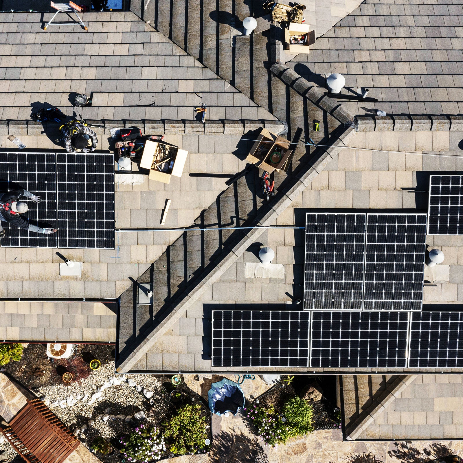 aerial of solar panels on rooftop